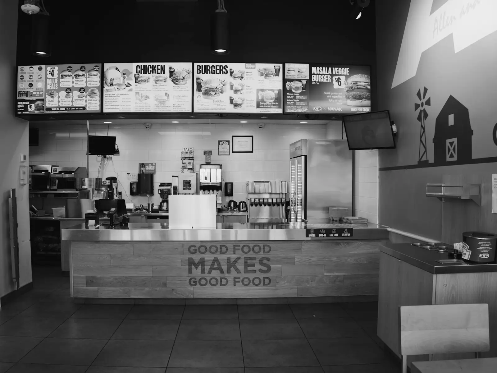 Quick-service restaurant counter with digital menu boards
