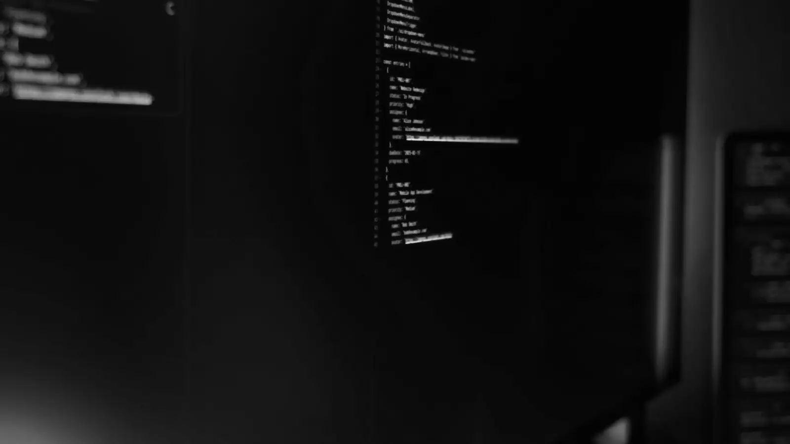 Source code on a monitor in a dark room